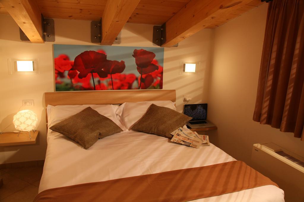Residence Ilario Suite Hotel Річчоне Номер фото